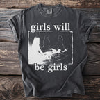 Dark grey t-shirt with white text "girls will be girls" and a distressed graphic.