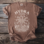 Brown t-shirt with white graphic of a five-headed hydra serpent and text HYDRA.