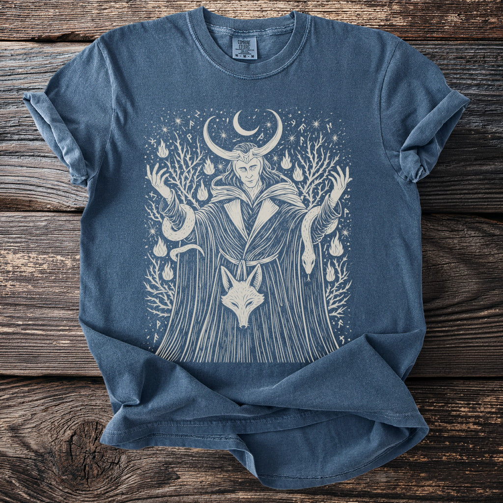 Blue t-shirt with a light tan graphic of Loki, a fox, and serpents.