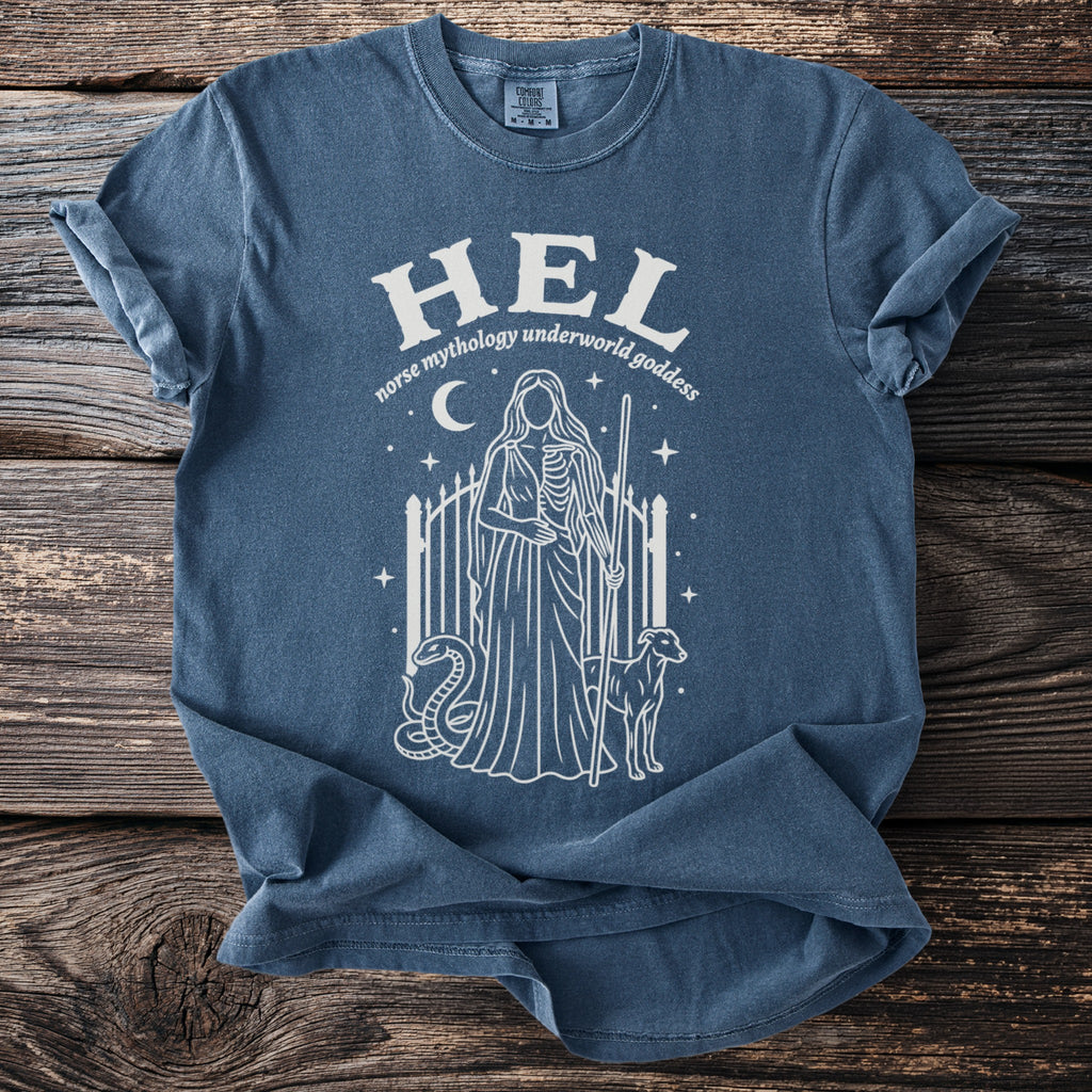 Blue t-shirt with white graphic of Hel, Norse underworld goddess, with snake and dog.
