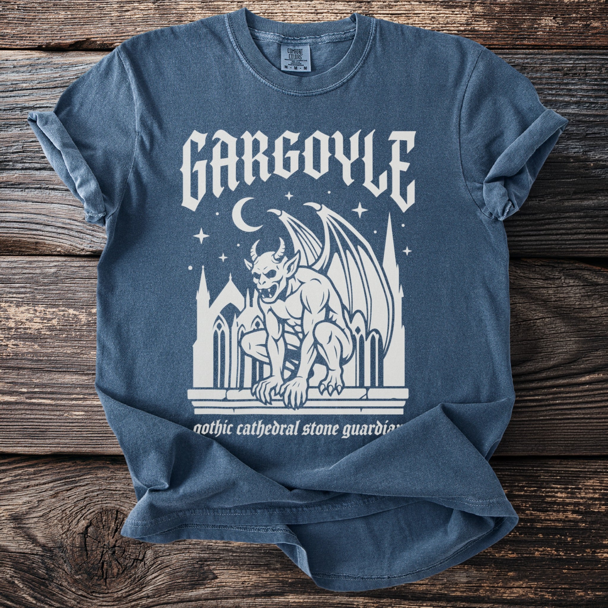 Blue t-shirt with gothic gargoyle graphic and "Gargoyle" text.