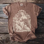 Brown t-shirt with cream graphic of a woman, two cats, and moon phases.
