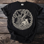 Black t-shirt with graphic of robed figure, bull, tree, moon, and Celtic knot.