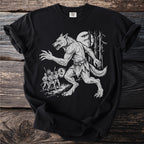 Werewolf running from men with lanterns in a forest scene on a black t-shirt.