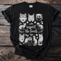 Black t-shirt with wildlife illustrations and text "respect the locals".