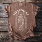 Brown t-shirt with white Persephone Greek mythology spring goddess graphic.
