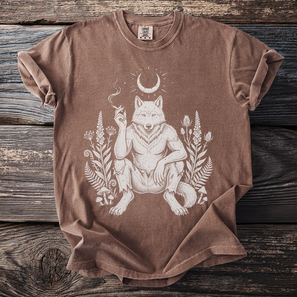Brown t-shirt with a white graphic of a werewolf smoking under a crescent moon.