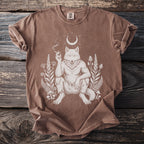 Brown t-shirt with a white graphic of a werewolf smoking under a crescent moon.