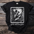 Black t-shirt with "girls will be girls" and a gothic illustration of two women with thorns and roses.