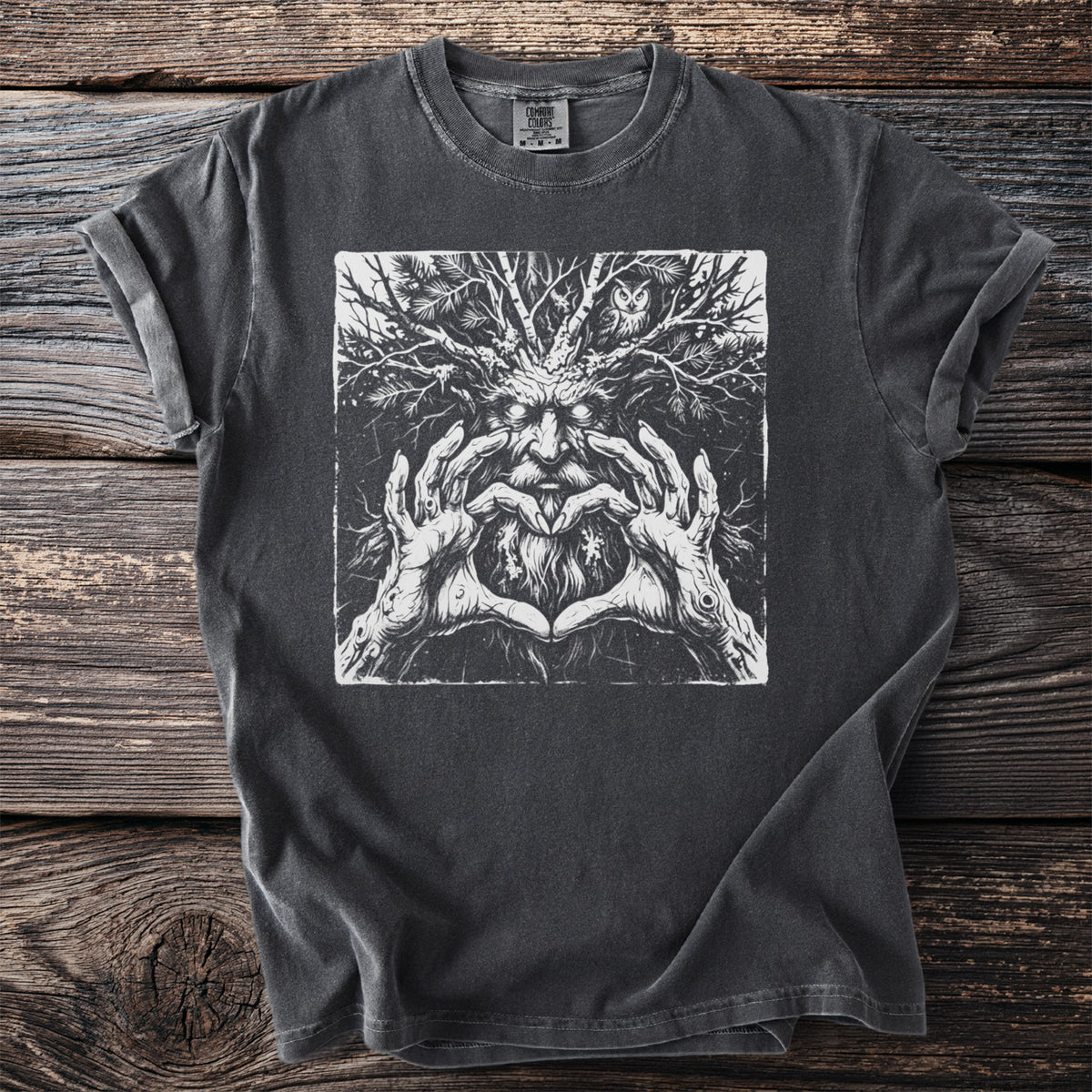 Dark grey t-shirt with a black and white graphic of a tree-like faced man with hands forming a heart.