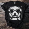 Black t-shirt with a grunge style illustration of a dog wearing sunglasses and drinking from a cup.