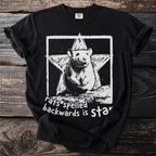 Black t-shirt with a white graphic of a rat in front of a star, text says "rats spelled backwards is star".
