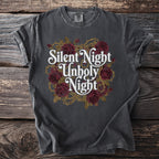 Dark t-shirt with white text "Silent Night Unholy Night" and red roses.