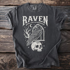 T-shirt with "Raven gothic crow corvid familiar" text and a raven on a skull.