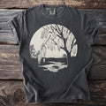Dark gray t-shirt with a cream-colored circular graphic of a tree with catkins.