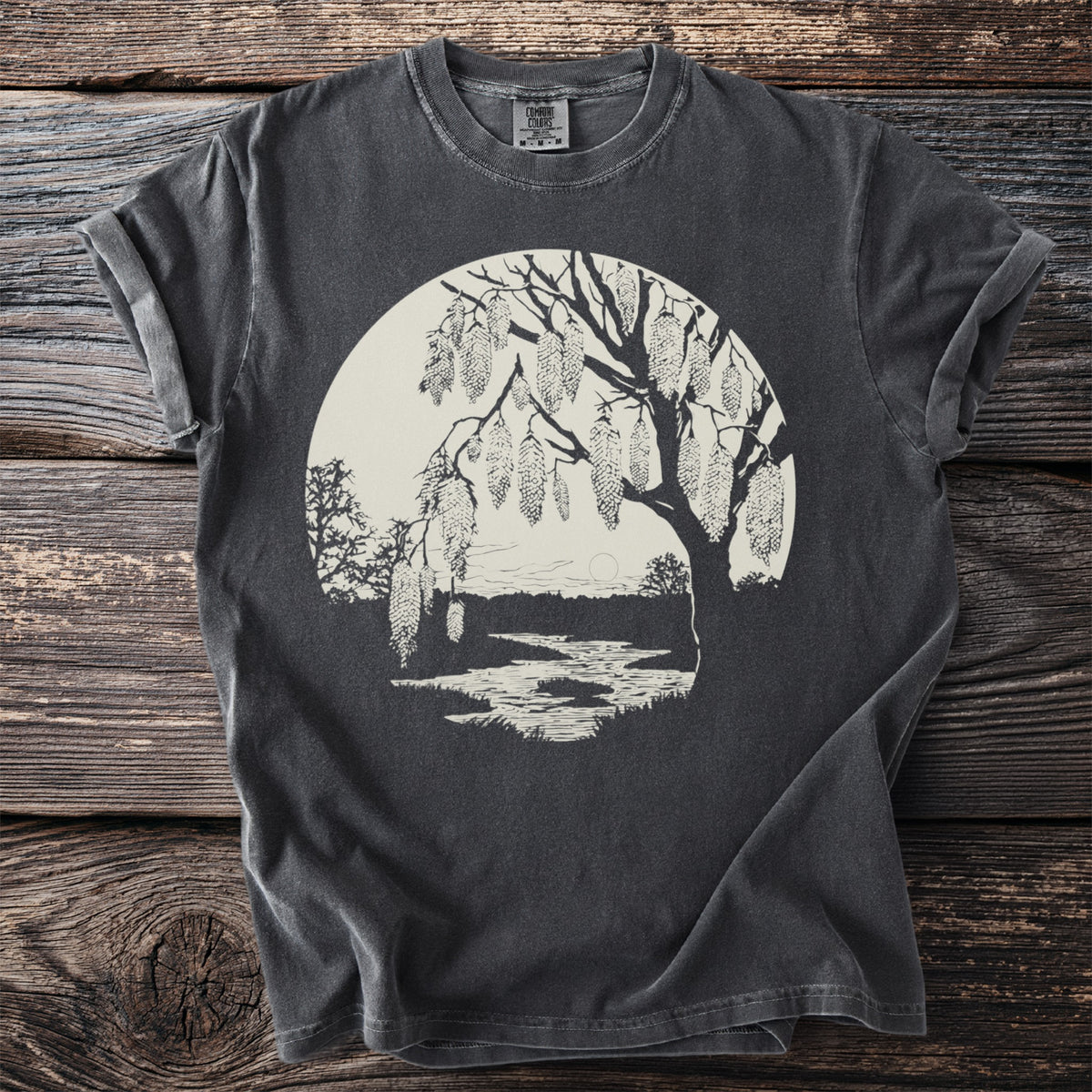 Dark gray t-shirt with a cream-colored circular graphic of a tree with catkins.