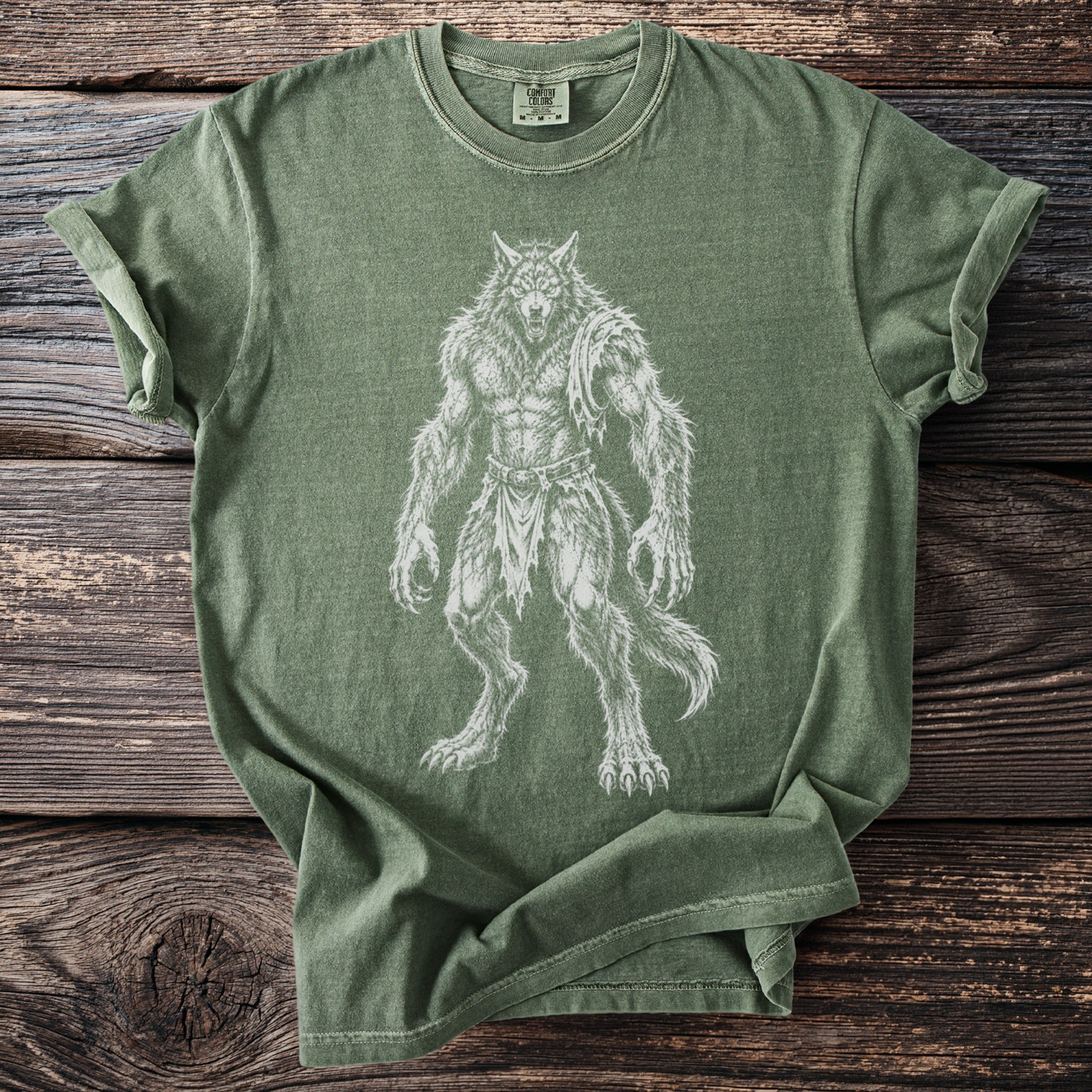 Green t-shirt with white werewolf graphic, Comfort Colors tag visible.