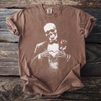 Brown t-shirt with white print of a skeleton holding a rose and making a heart shape.
