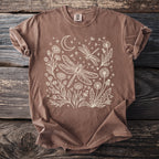 Brown t-shirt with cream dragonfly and floral design.