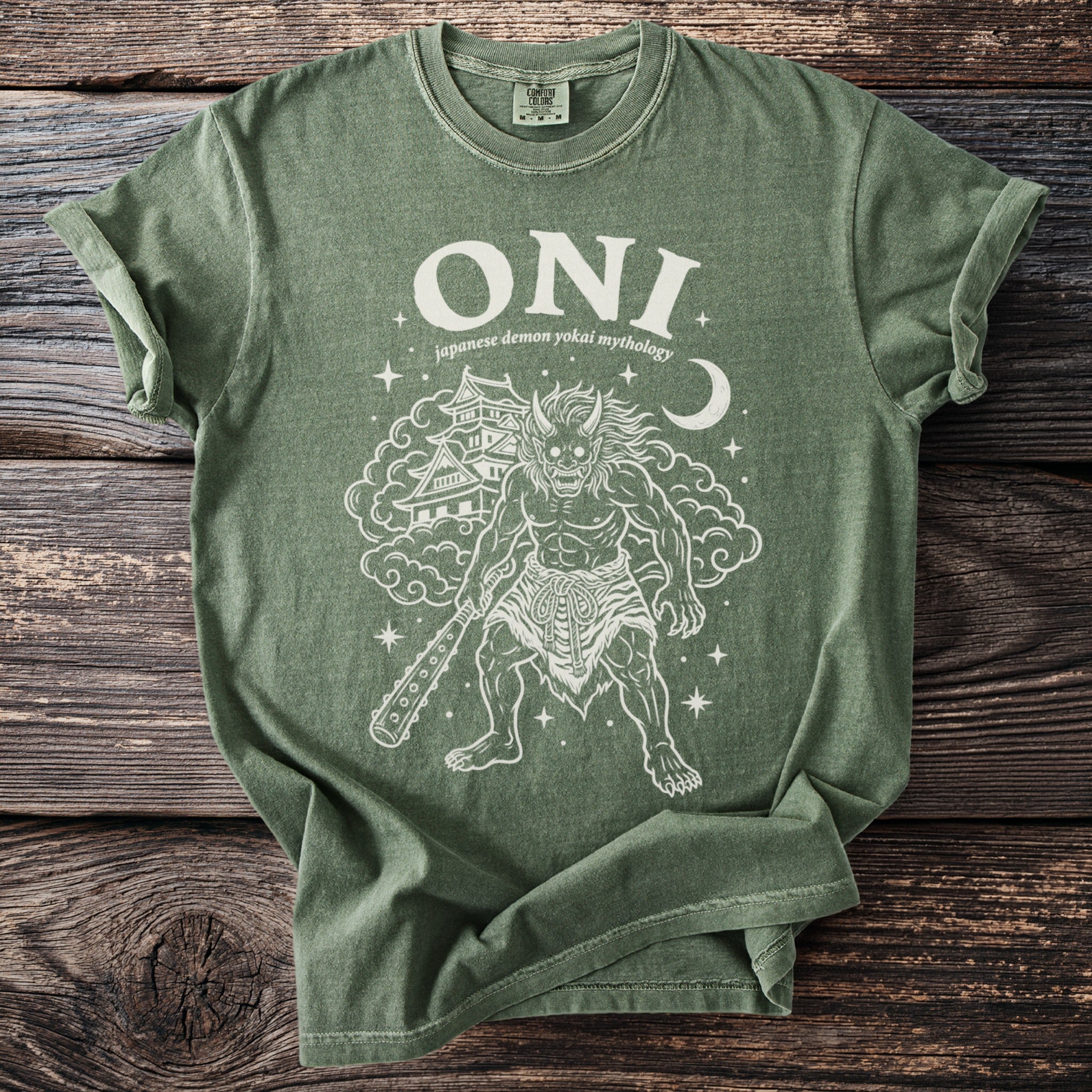 Green t-shirt with "ONI japanese demon yokai mythology" and white line art.