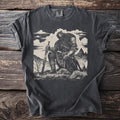 Dark t-shirt with graphic of a knight kneeling with a sword on a rocky landscape.
