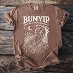 Bunyip Australian Swamp Cryptid Legend graphic t-shirt with moon and stars.