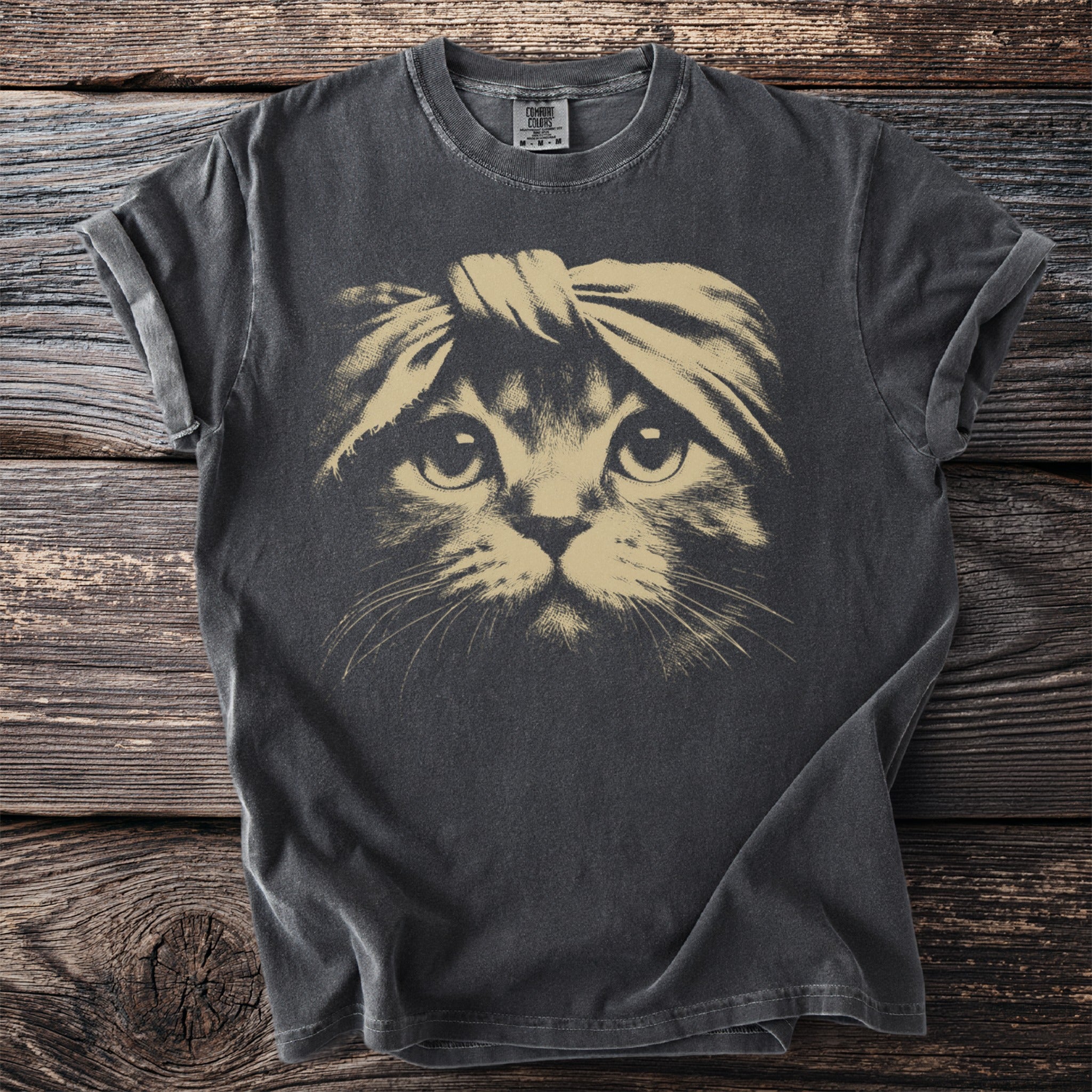 Charcoal t-shirt with a distressed tan graphic of a cat wearing a headband.