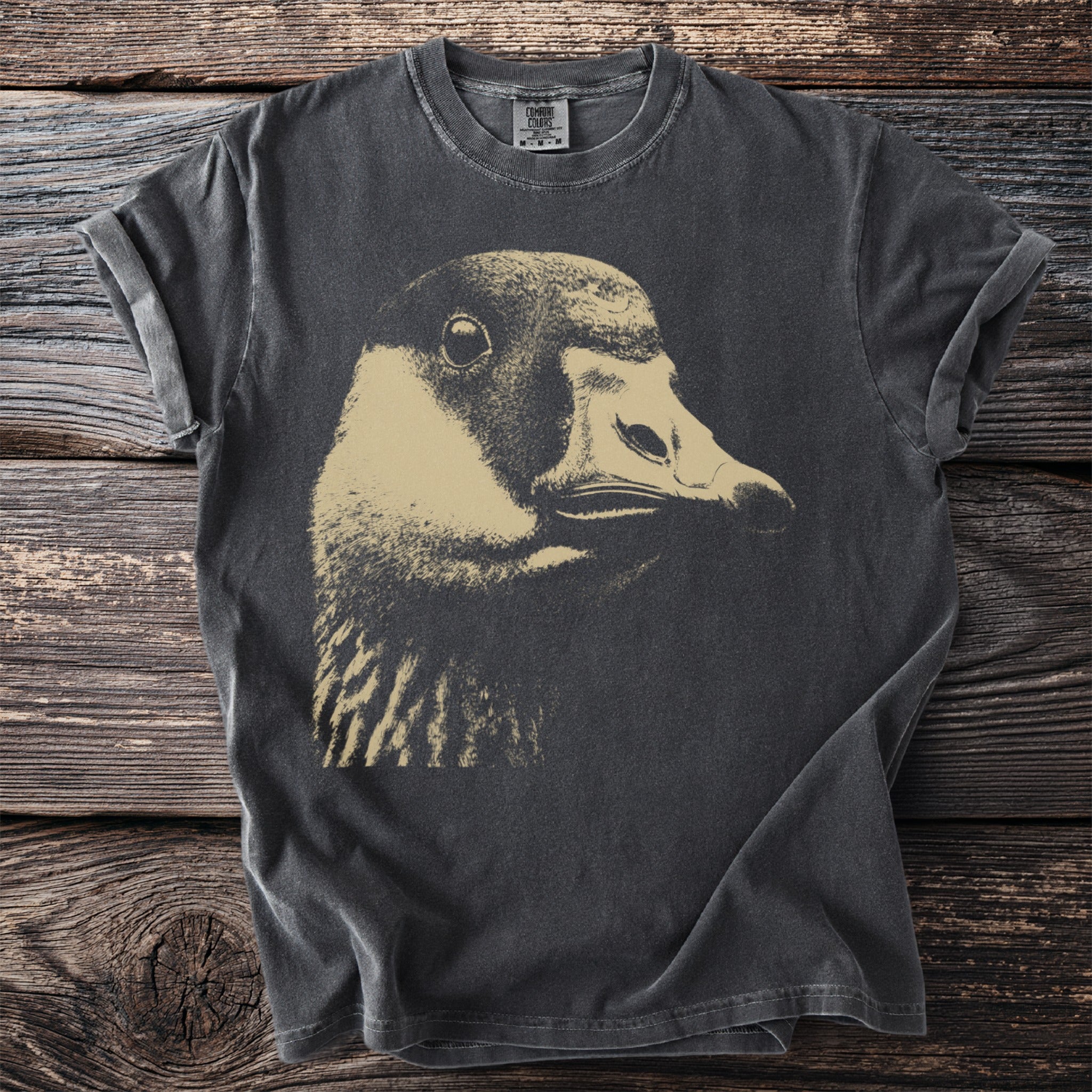 Dark grey t-shirt with a close-up, sepia-toned graphic of a goose's head.