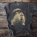 Dark t-shirt with a vintage sketch of a capybara wearing a bucket hat.