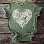 Green t-shirt with white bat heart graphic and Comfort Colors tag.