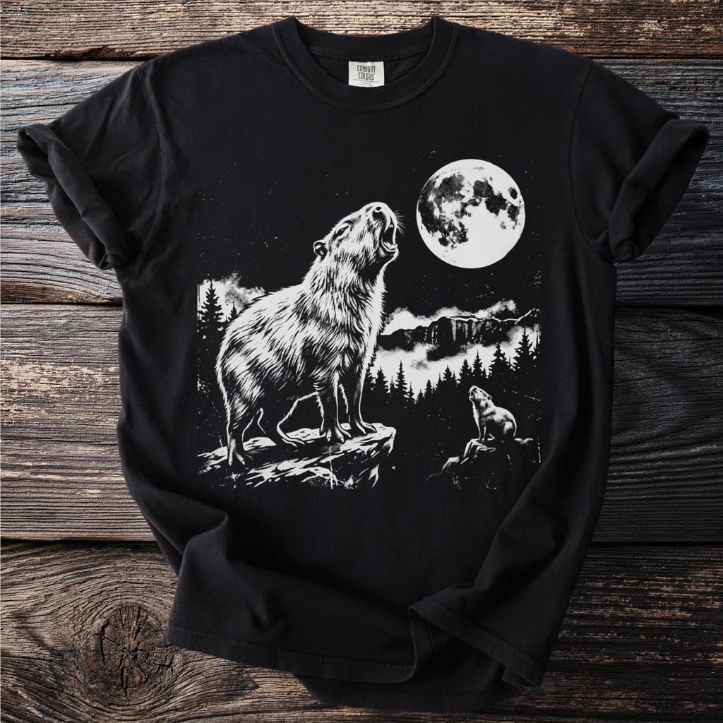 Black t-shirt with white graphic of a capybara howling at the moon.