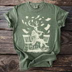 Green t-shirt with a beige graphic of a deer-headed figure playing a violin.