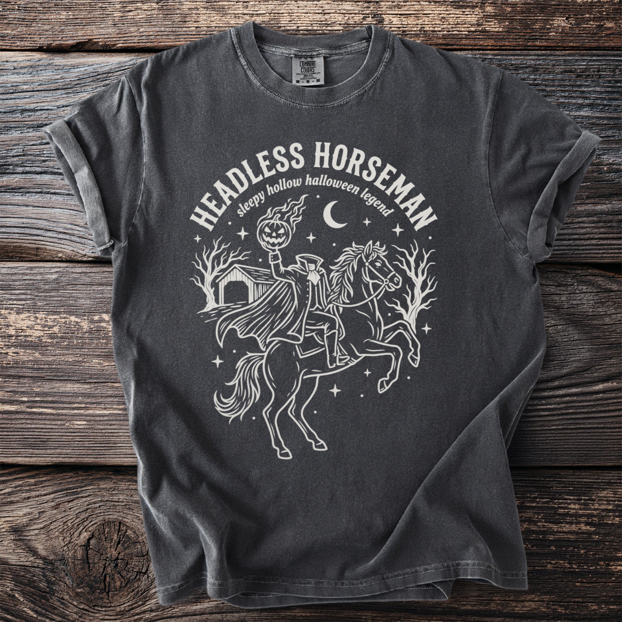 Dark gray t-shirt with a white graphic of the Headless Horseman on a horse.