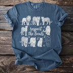 Blue t-shirt featuring line art of various big cats and the text "respect the locals."