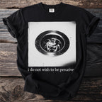 Black t-shirt with a frog in a drain graphic and text "i do not wish to be perceive".