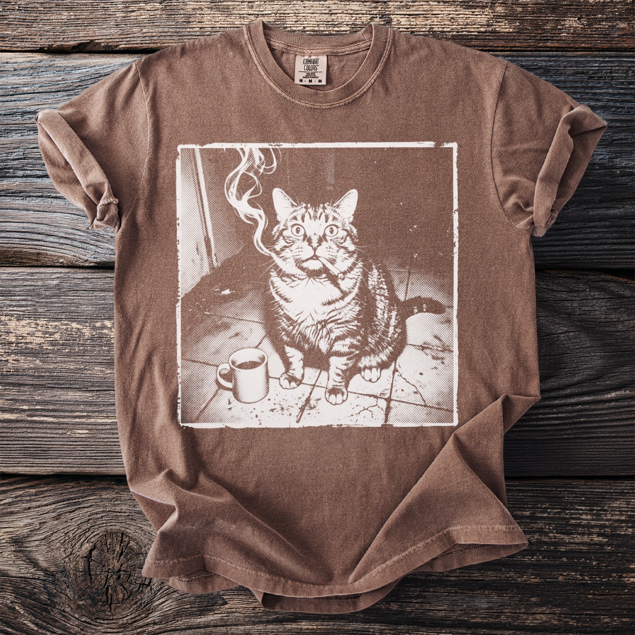 Brown t-shirt with a graphic of a tabby cat smoking and a coffee cup.