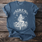 Blue t-shirt with white siren design, harp, and shipwreck, "SIREN Greek sea nymph mythology" text.