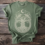 Green t-shirt with tree of life, ravens, moon, stars, and runes design.