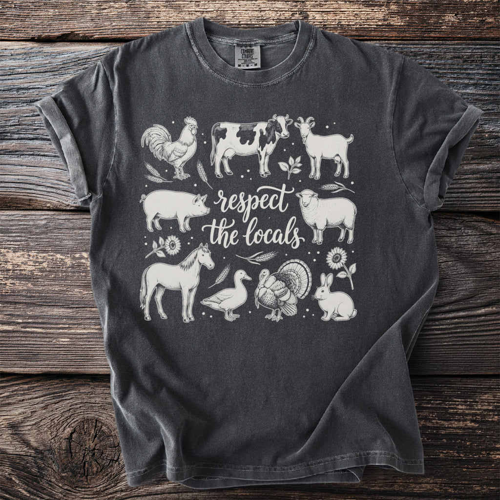Dark grey t-shirt with line drawing of farm animals and the text "respect the locals".