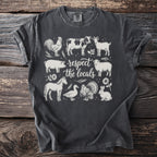 Dark grey t-shirt with line drawing of farm animals and the text "respect the locals".