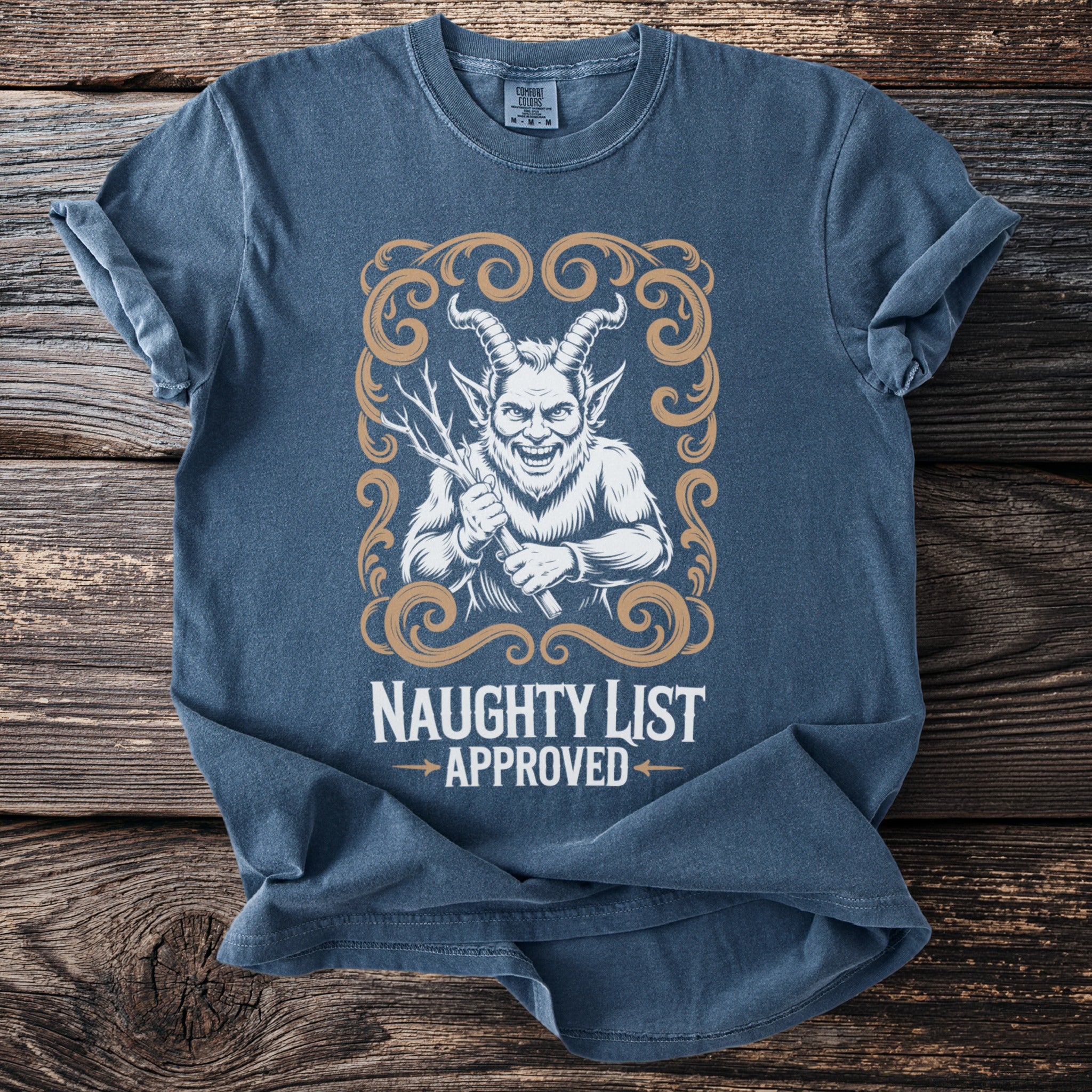Blue t-shirt with Krampus illustration and text "Naughty List Approved."