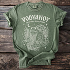 Green t-shirt with white Vodyanoy Slavic water demon folklore design.