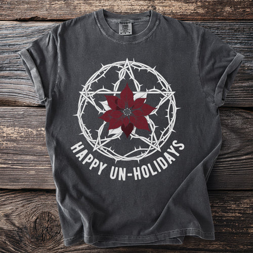 Dark gray t-shirt with white pentagram, poinsettia, and text "HAPPY UN-HOLIDAYS".