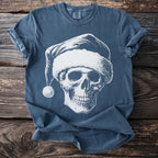 Blue t-shirt with white graphic of a skull wearing a Santa hat and a pom-pom.