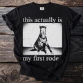 Black t-shirt with a distressed image of a horse and text this actually is my first rode.