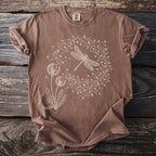 Brown t-shirt with a white line art dragonfly and dandelion design.