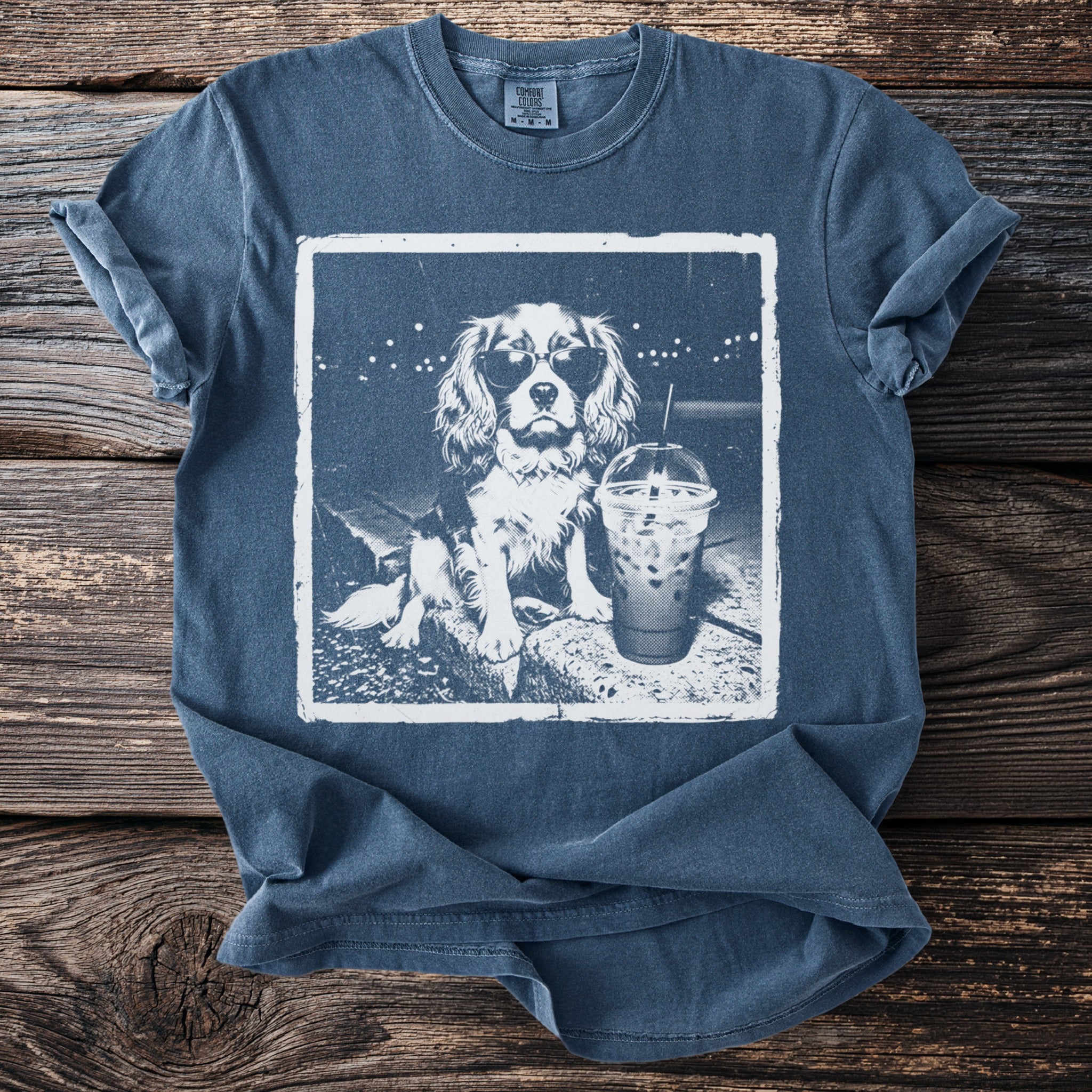 T-shirt with a graphic of a Cavalier King Charles Spaniel dog wearing sunglasses and a drink.
