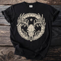 Black t-shirt with a cream-colored graphic of a deer skull surrounded by antlers and runes.