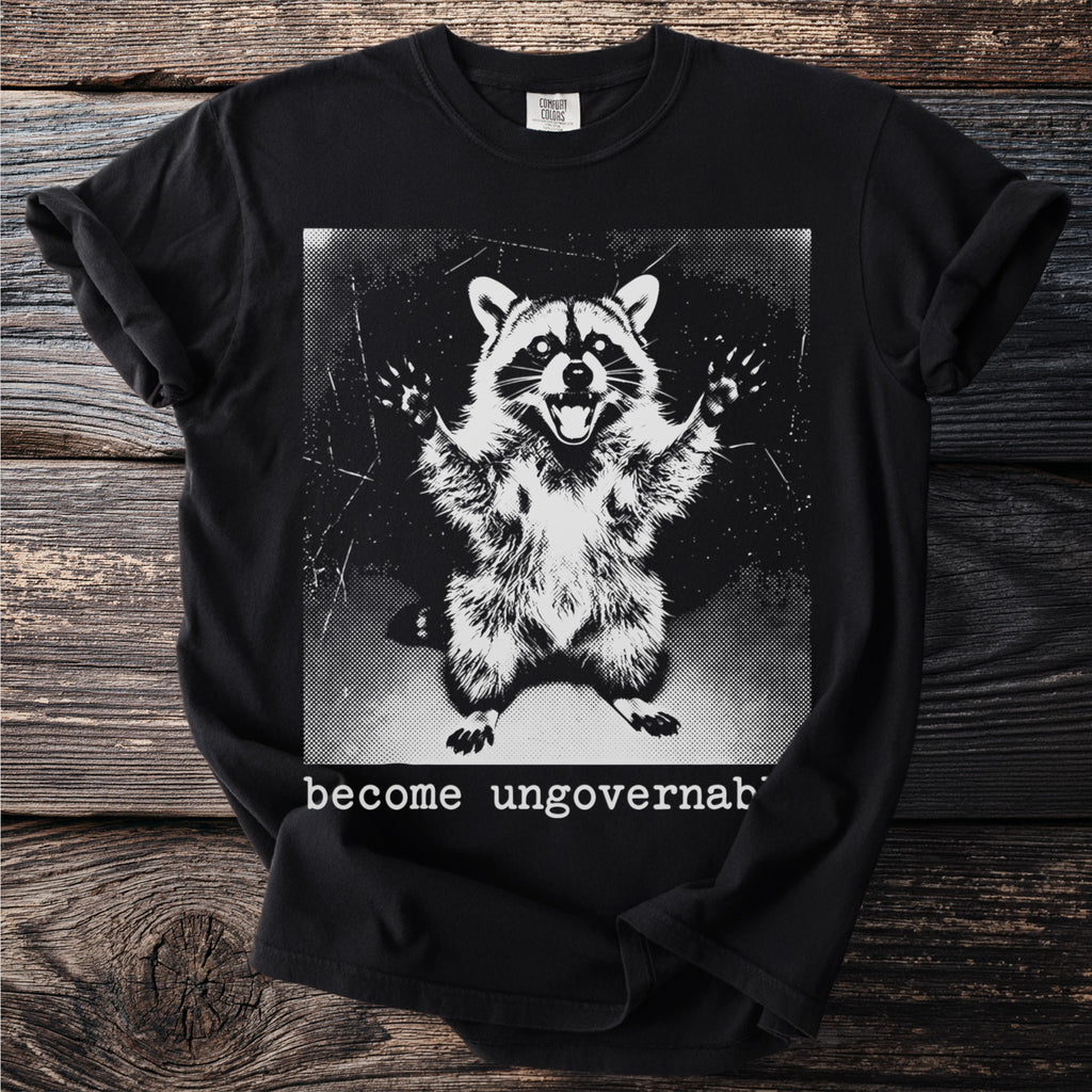 Black t-shirt with a graphic of a raccoon and text that reads "become ungovernable".