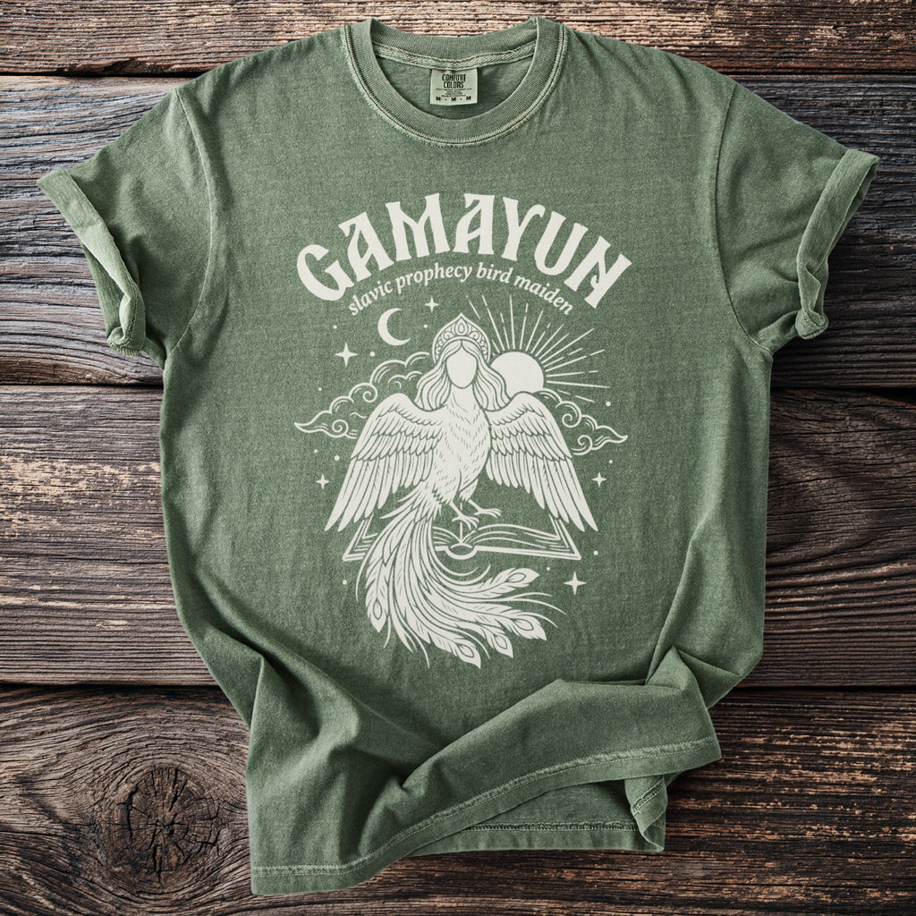 Green t-shirt with "Gamayun slavic prophecy bird maiden" text and illustration.